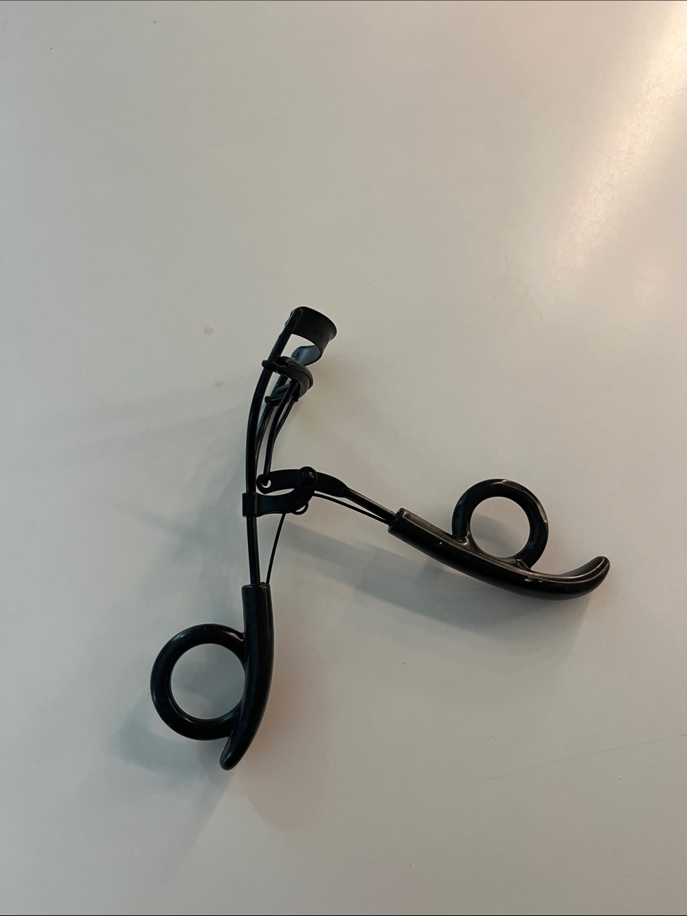 Eye lash curler